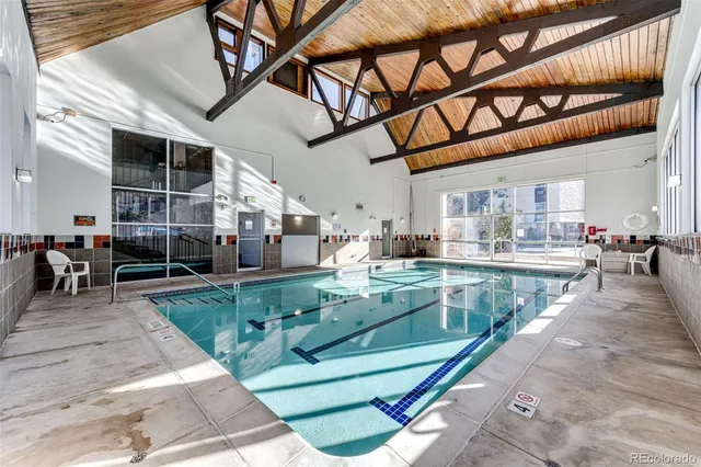 a view of a swimming pool with a patio
