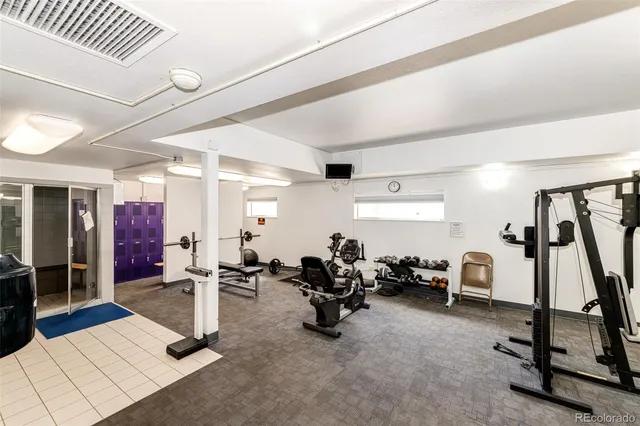 a view of pool with tall buildings