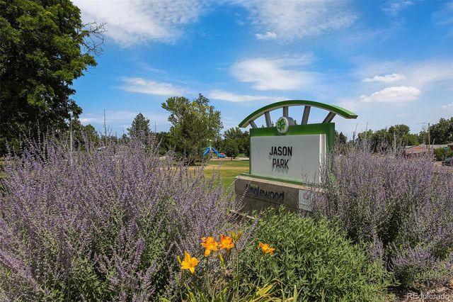 a view of a sign board with a big yard