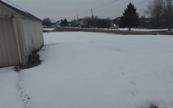 a view of swimming pool with outdoor seating