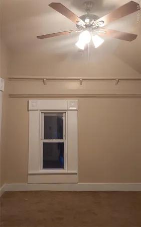 a view of a small space with a fan