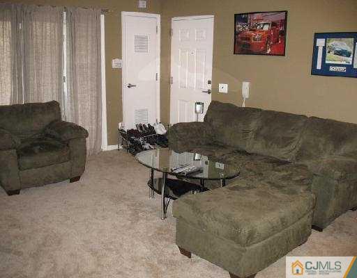 1116 Edpas Road New Brunswick, NJ 08901 - Photo 3 of 10 a living room with couches and furniture