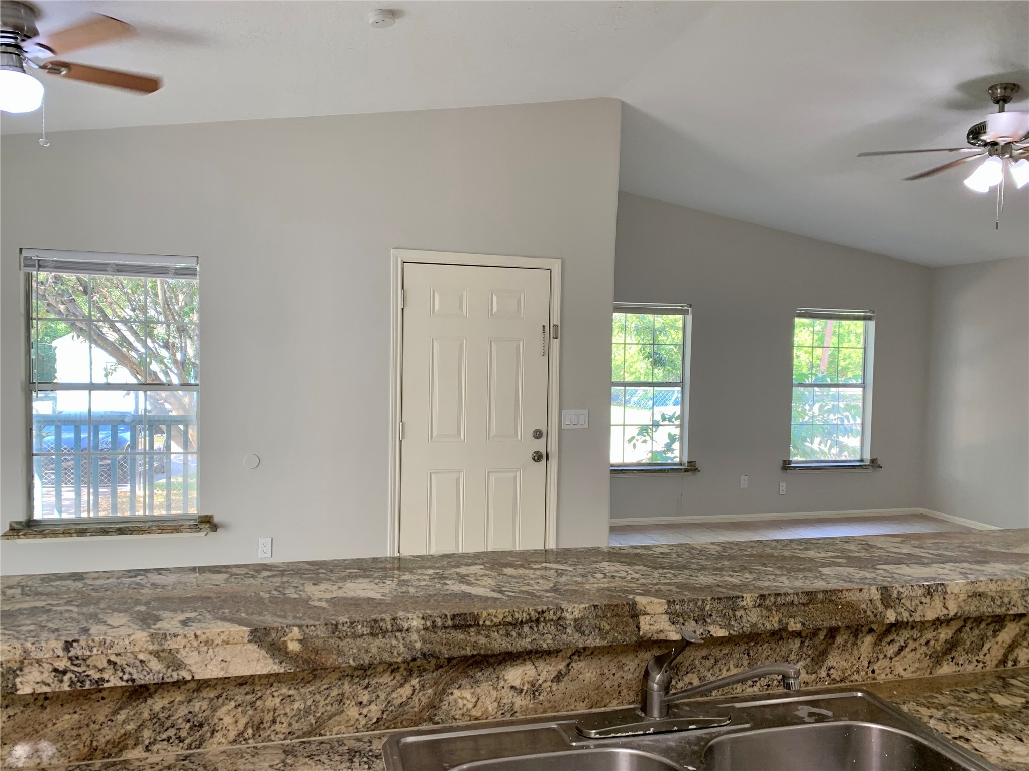 6723 Del Rio Street Houston, TX 77021 - Photo 11 of 29 a view of a livingroom with wooden floor and window