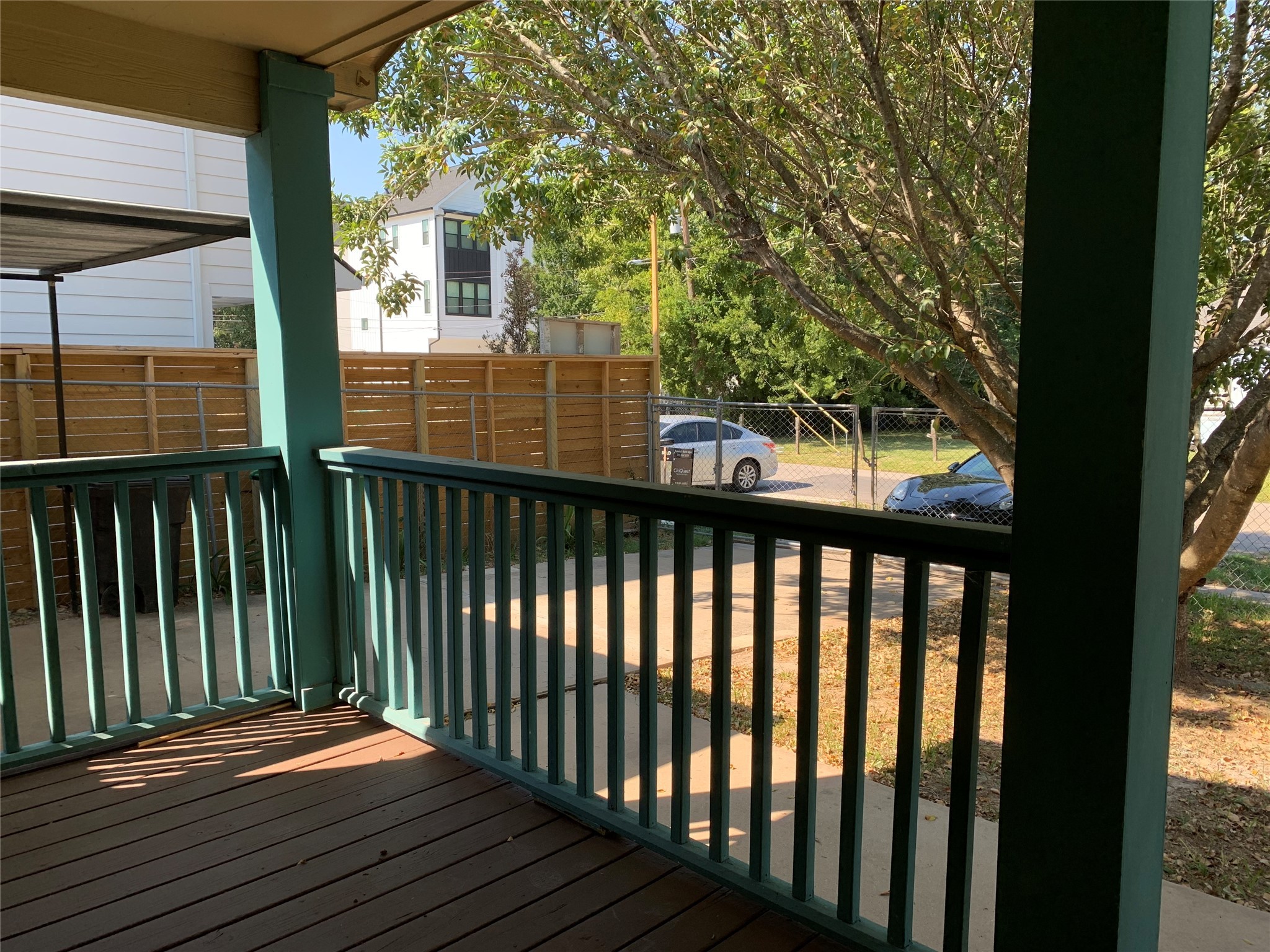 6723 Del Rio Street Houston, TX 77021 - Photo 27 of 29 a balcony with view of trees in front of it