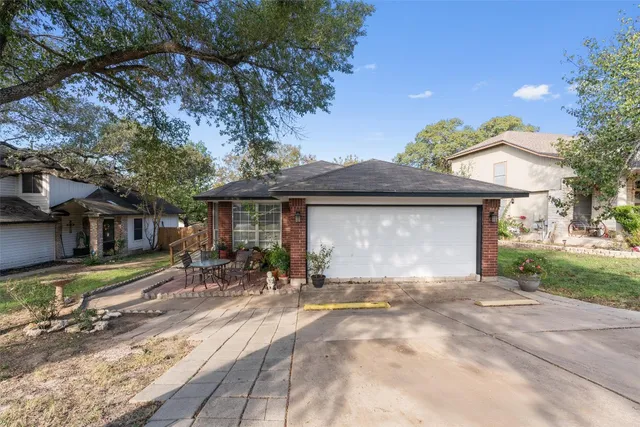 a view of a house with a patio
