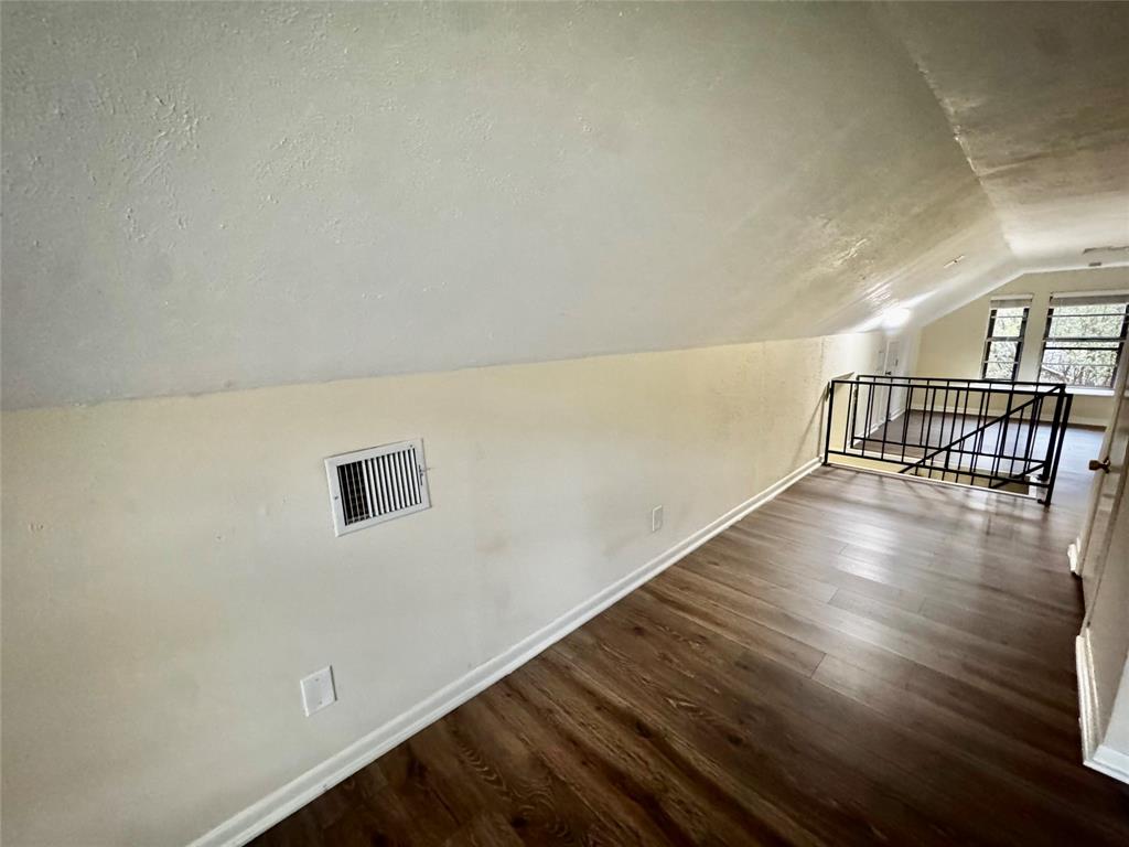 1706 Saddle Road Granbury, TX 76049 - Photo 15 of 29 a view of wooden floor in an empty room