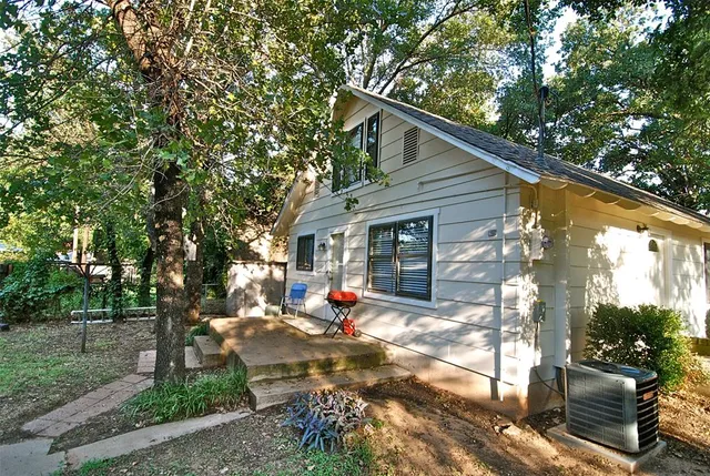 a view of outdoor space with deck and patio