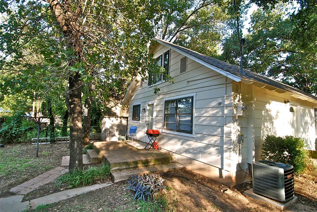 1706 Saddle Road Granbury, TX 76049 - Photo 29 of 29 a view of outdoor space with deck and patio