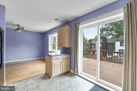 a view of a kitchen with a stove top oven
