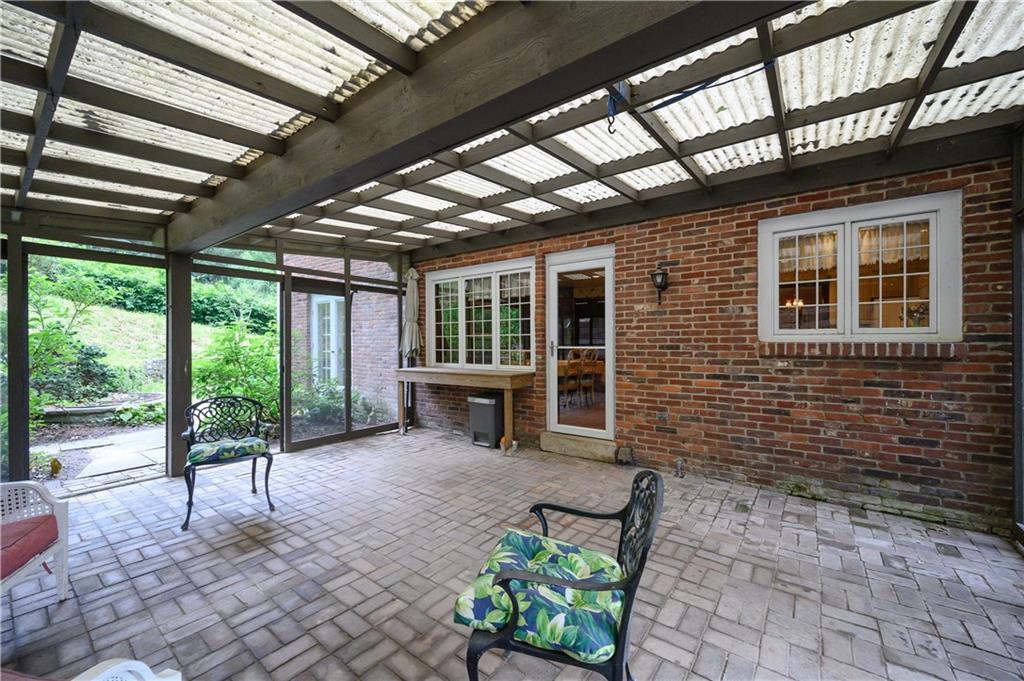 24 Myrtle Hill Road Sewickley, PA 15143 - Photo 20 of 21 Screened back porch accessed from kitchen