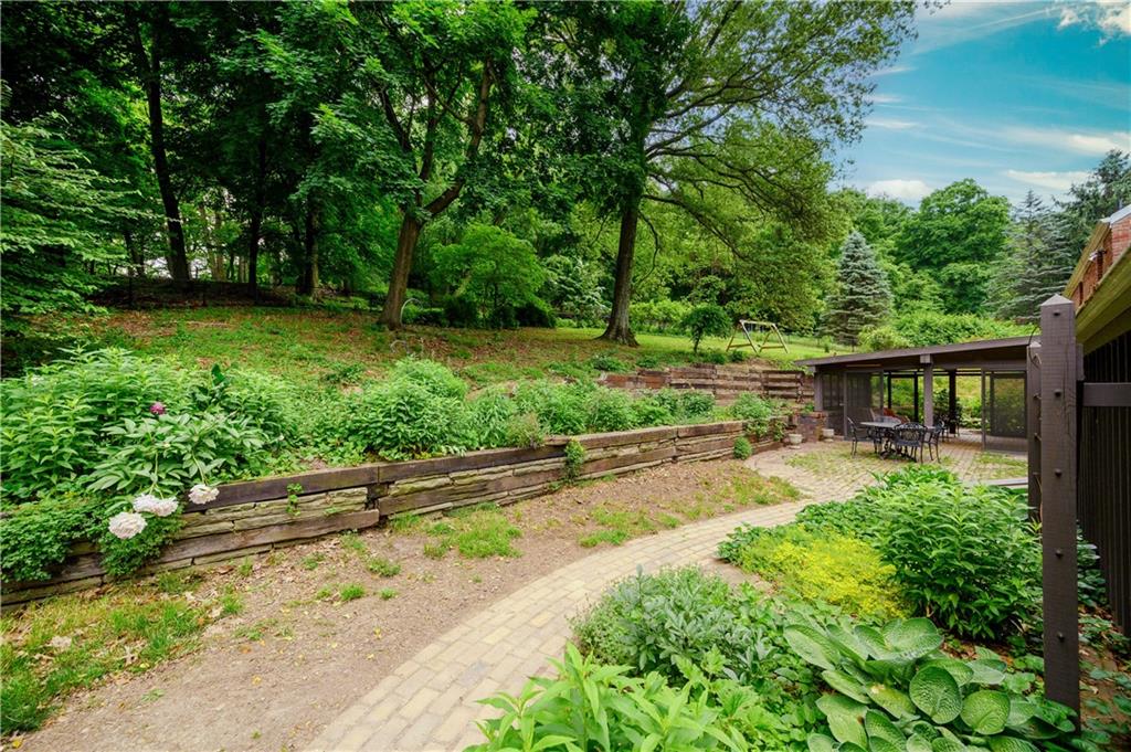 24 Myrtle Hill Road Sewickley, PA 15143 - Photo 21 of 21 Walkway to brick patio and screened porch