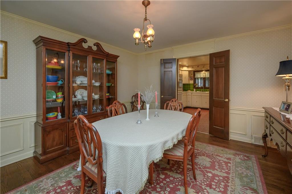 24 Myrtle Hill Road Sewickley, PA 15143 - Photo 6 of 21 Dining room with paneled wainscoting. Hardwood floors.