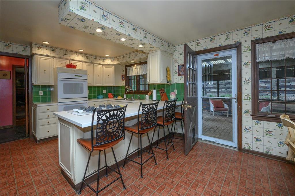 24 Myrtle Hill Road Sewickley, PA 15143 - Photo 8 of 21 Kitchen with door out to screened porch