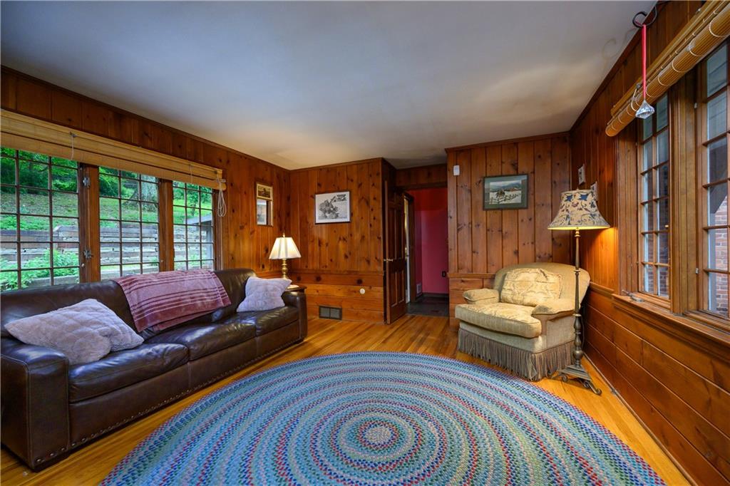 24 Myrtle Hill Road Sewickley, PA 15143 - Photo 10 of 21 Family room. Hardwood floors.