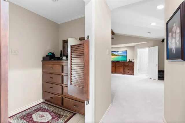 a bathroom with a shower and a glass door