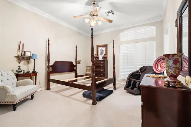 a bathroom with a toilet a sink a vanity and mirror