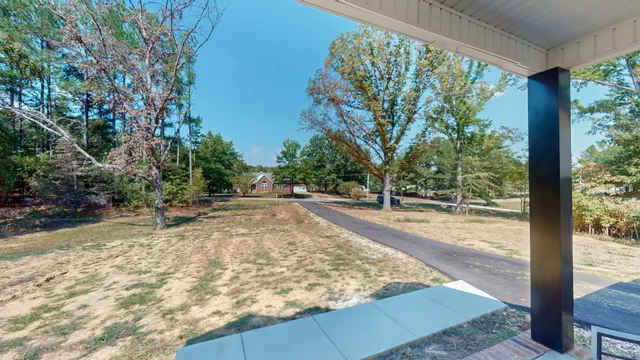 a view of a backyard of a house