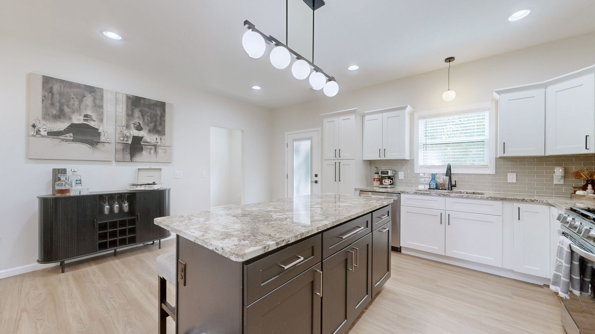 140 Jackson Forest Road Paris, TN 38242 - Photo 7 of 33 a kitchen with stainless steel appliances granite countertop a sink stove and refrigerator