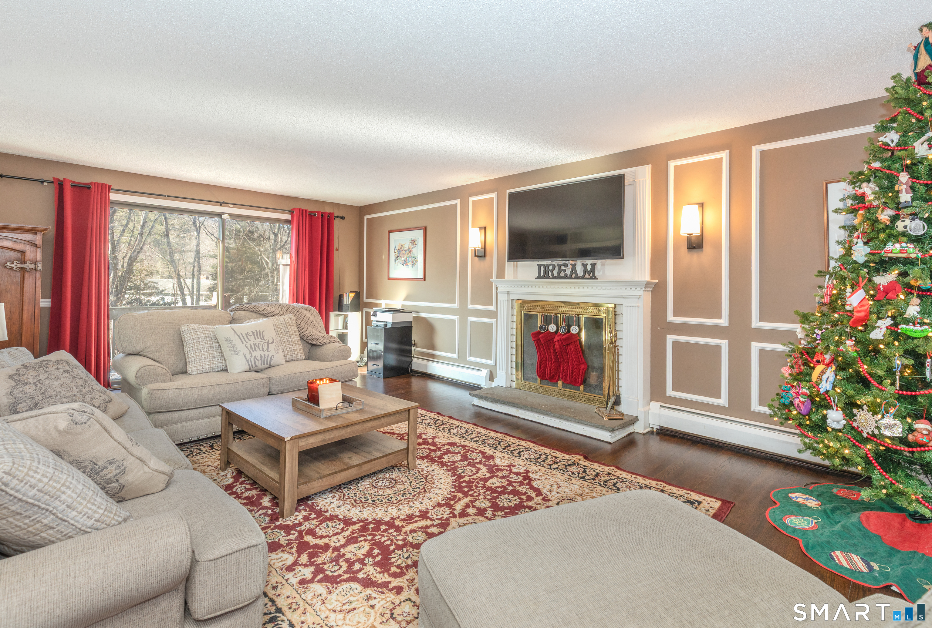 637 Watertown Road Middlebury, CT 06762 - Photo 2 of 40 a living room with furniture fireplace and flat screen tv