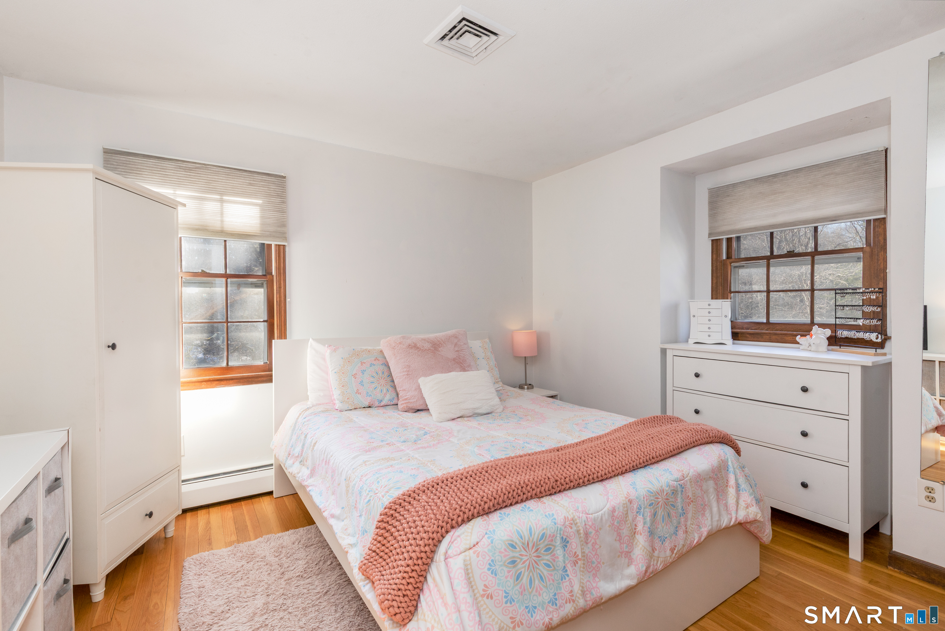 637 Watertown Road Middlebury, CT 06762 - Photo 22 of 40 a bedroom with a bed and a window