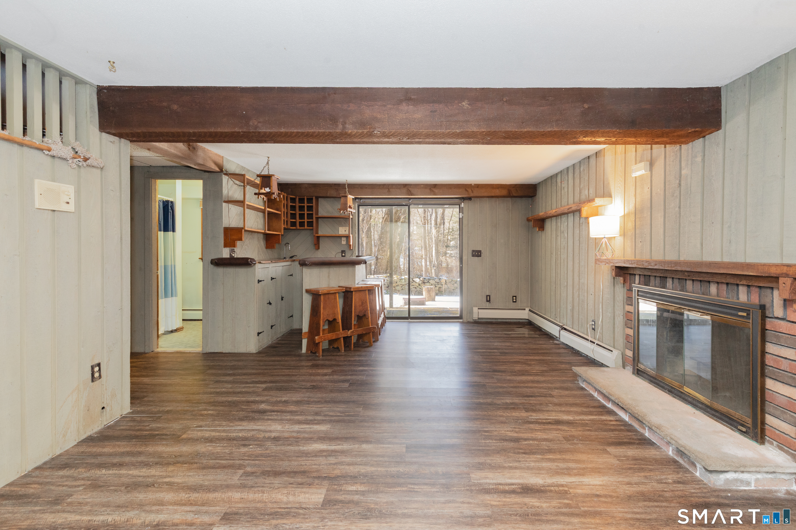 637 Watertown Road Middlebury, CT 06762 - Photo 27 of 40 a view of a kitchen with a sink and a fireplace
