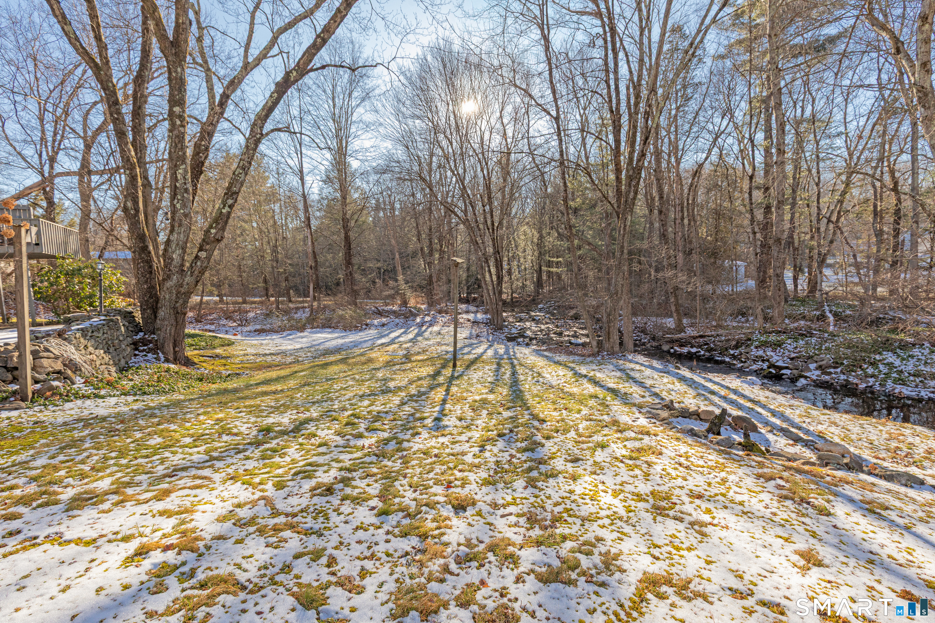 637 Watertown Road Middlebury, CT 06762 - Photo 37 of 40 a view of a backyard with large trees