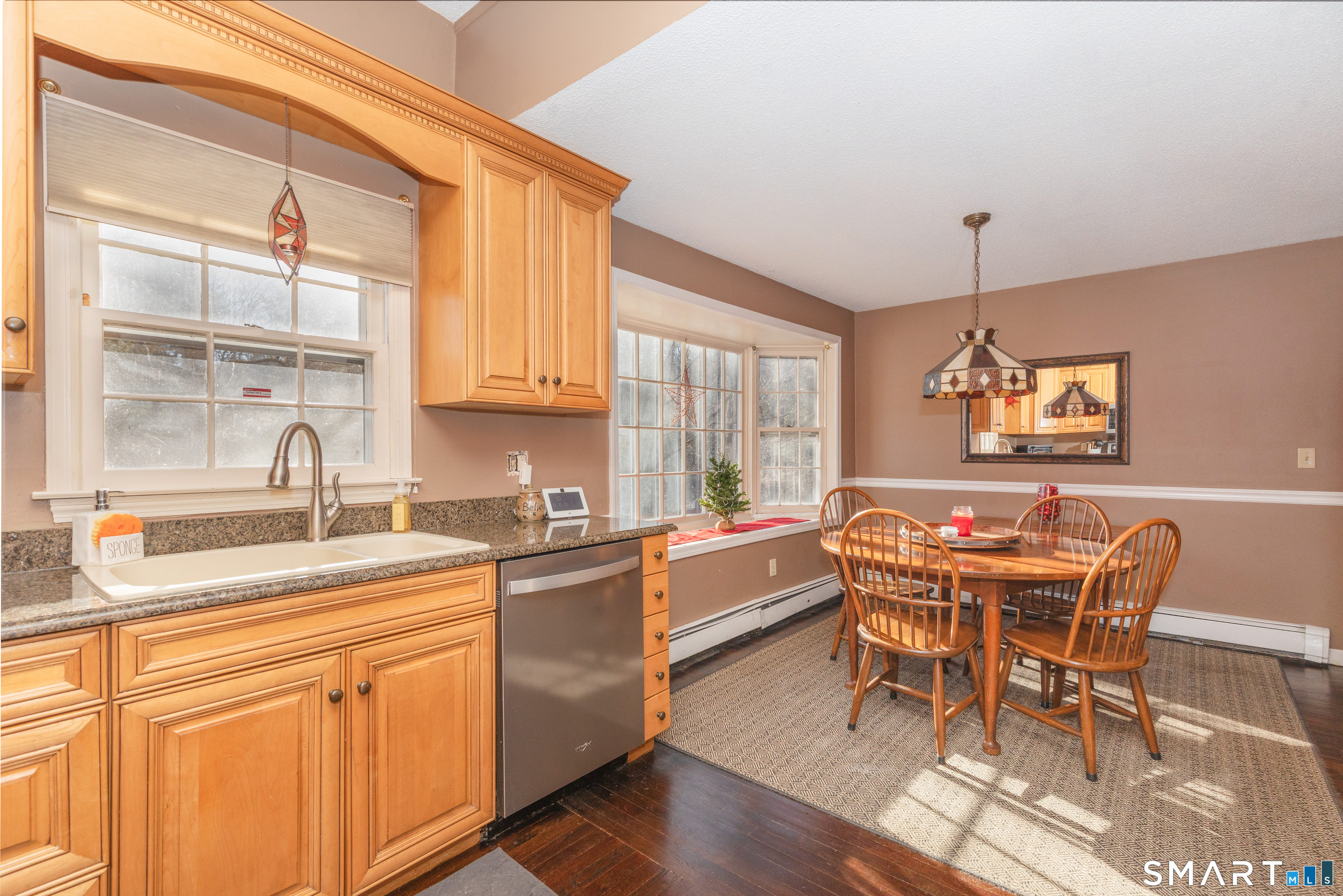 637 Watertown Road Middlebury, CT 06762 - Photo 8 of 40 a view of a dining room with furniture and window