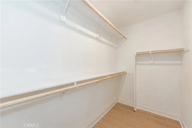 a view of an empty walk in closet