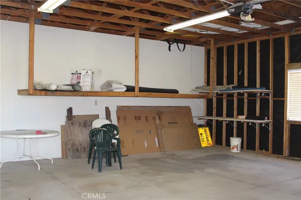 a view of a room with shelves