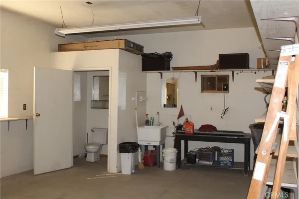 a view of a room with wooden walls