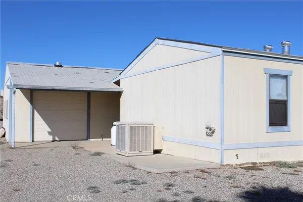 a view of a house with a garden