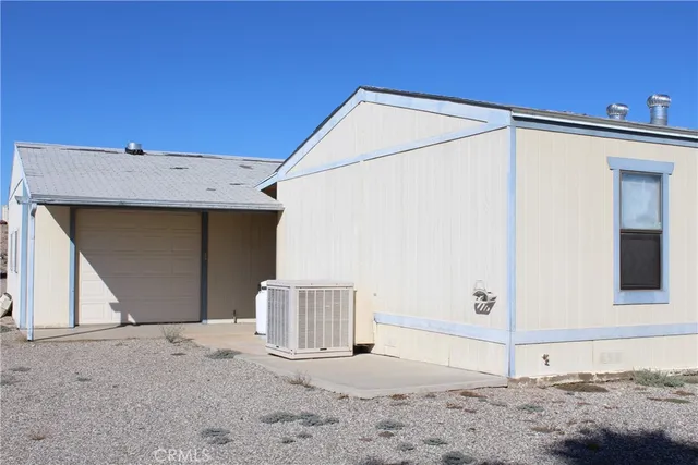 a view of a house with a garden
