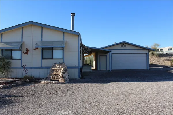 a bedroom with a bed and a closet