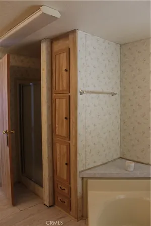 a kitchen with a sink stove and refrigerator