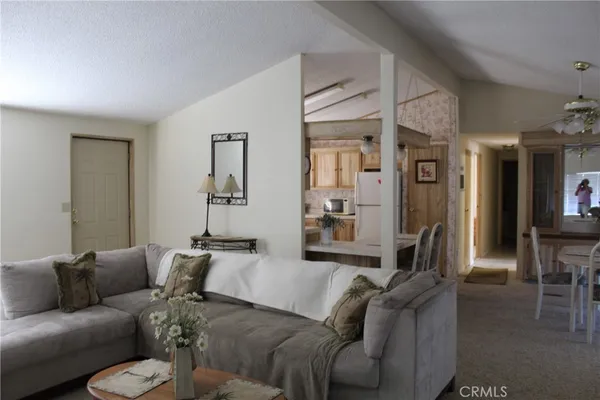 a living room with furniture and a couch