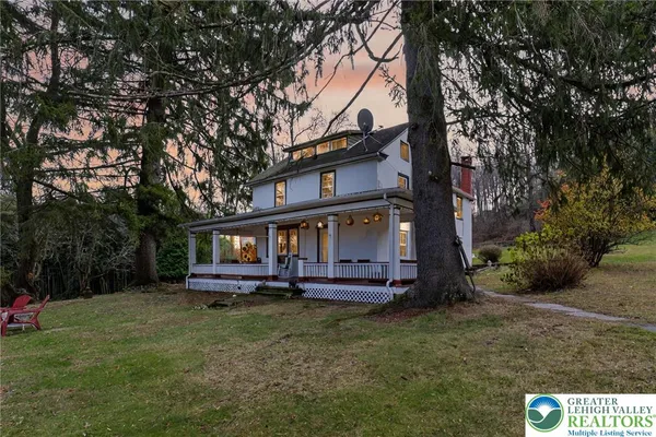 a view of a room with a large window