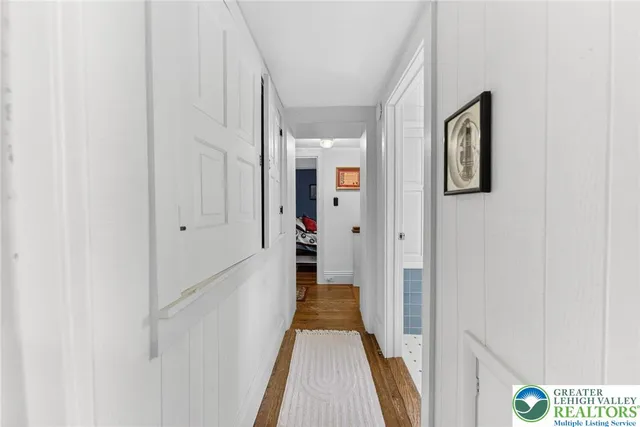 a view of living room with furniture and a window