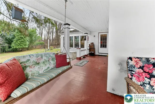 a view of a yard with a tree