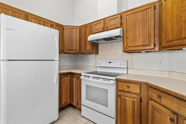 a view of a kitchen with washer and dryer