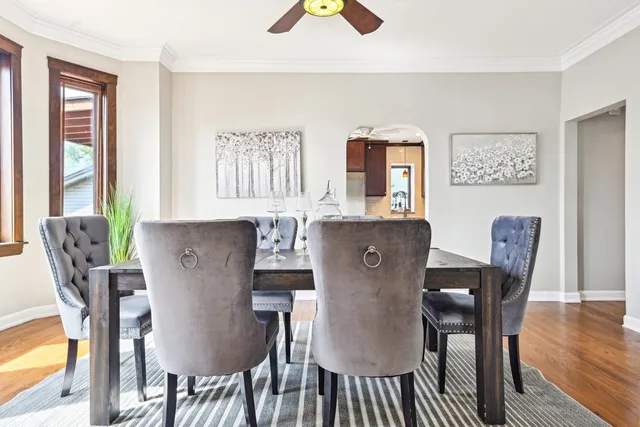 a kitchen with stainless steel appliances granite countertop wooden cabinets a stove top oven a sink and dishwasher