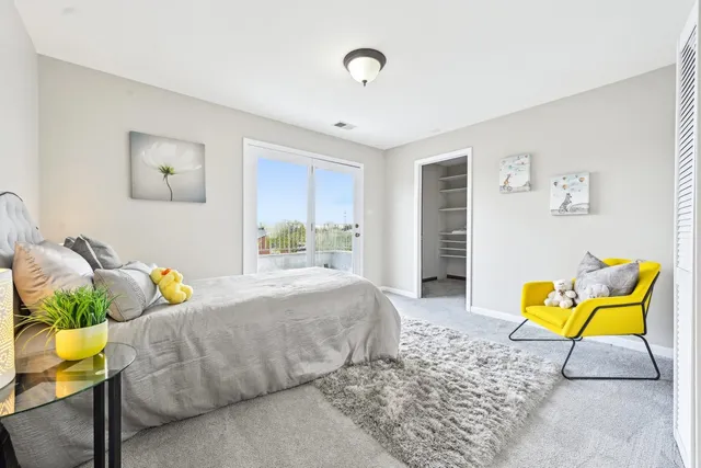 a bathroom with a sink vanity granite tub shower and a mirror