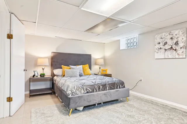 a view of a backyard with furniture and outdoor seating