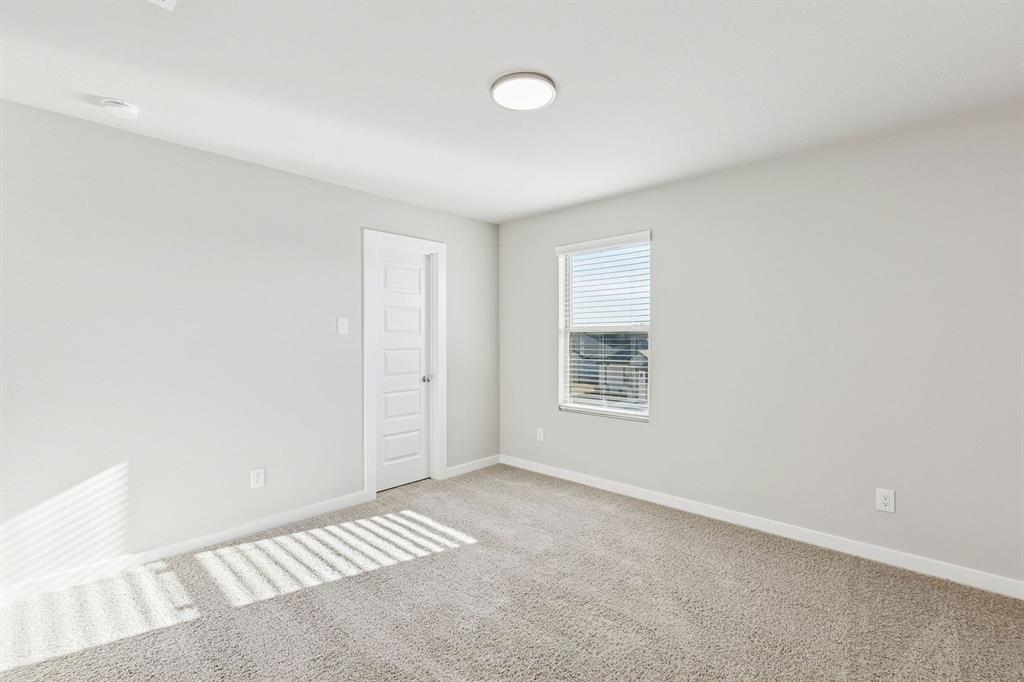 1156 Del Rio Drive Lavon, TX 75166 - Photo 26 of 35 a view of an empty room with a window