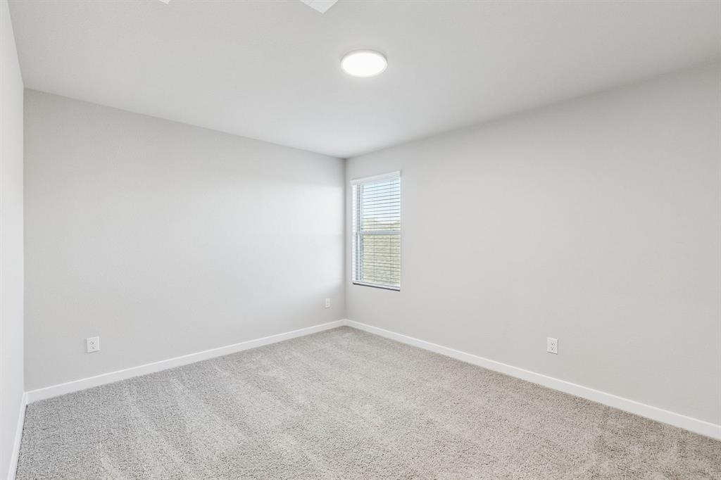 1156 Del Rio Drive Lavon, TX 75166 - Photo 28 of 35 an empty room with a empty space and window