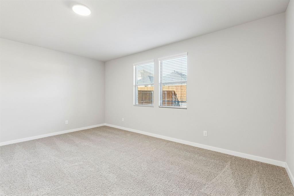 1156 Del Rio Drive Lavon, TX 75166 - Photo 30 of 35 an empty room with a window