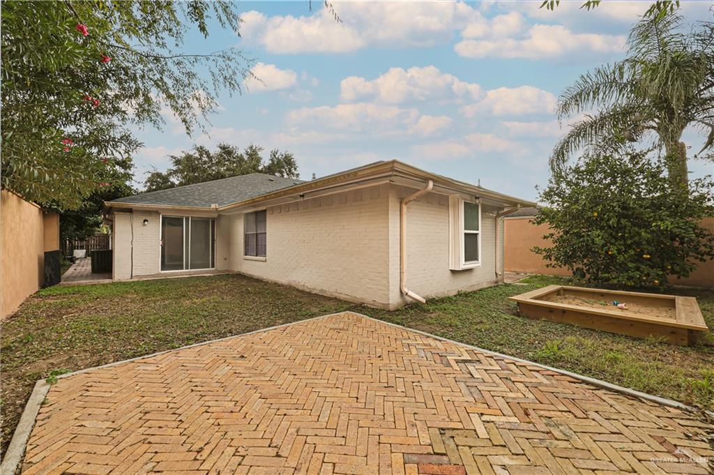 2401 South Jackson Road, Unit 29 Pharr, TX 78577 - Photo 18 of 20 a front view of a house with garden