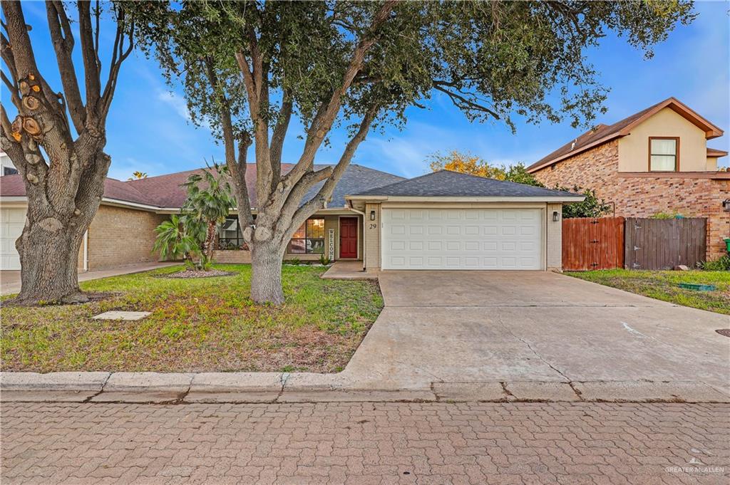 2401 South Jackson Road, Unit 29 Pharr, TX 78577 - Photo 20 of 20 a front view of a house with garden