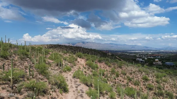 a view of a lake with a yard