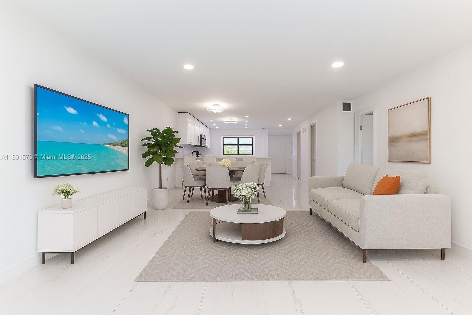 8435 Casa Del Lago, Unit 22C Boca Raton, FL 33433 - Photo 1 of 55 a living room with furniture and a flat screen tv