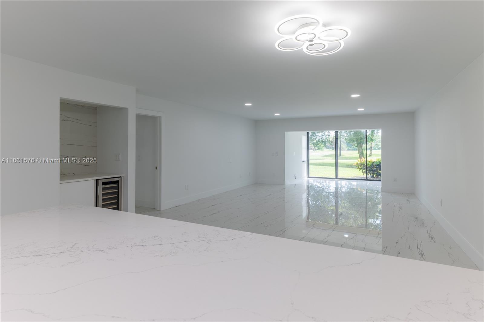 8435 Casa Del Lago, Unit 22C Boca Raton, FL 33433 - Photo 11 of 55 a view of an empty room with a window